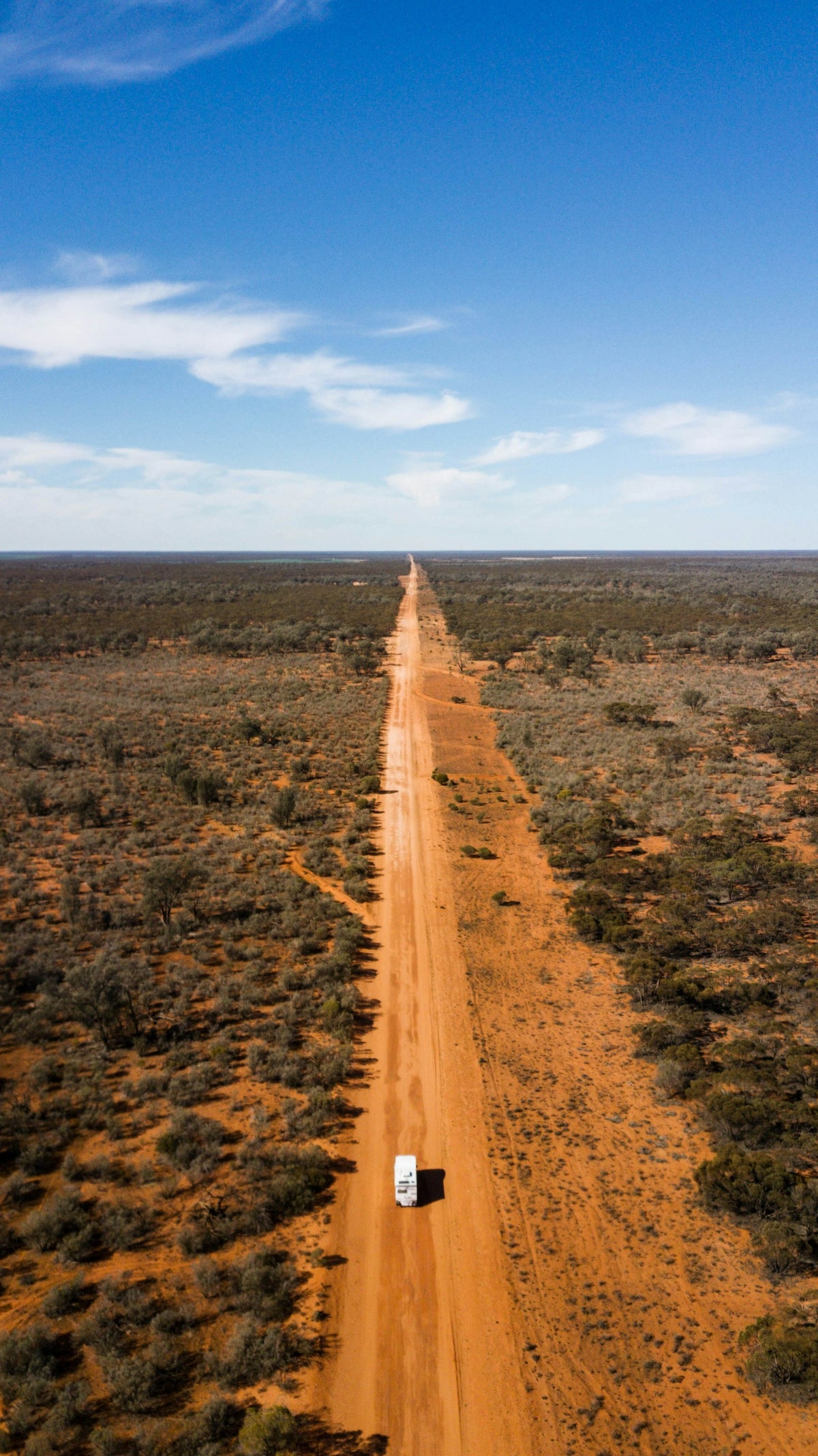 A vehicle on an open outback road in Australia