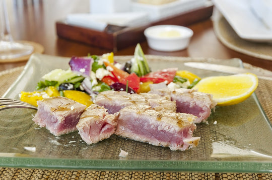 a close up of a plate of food with meat