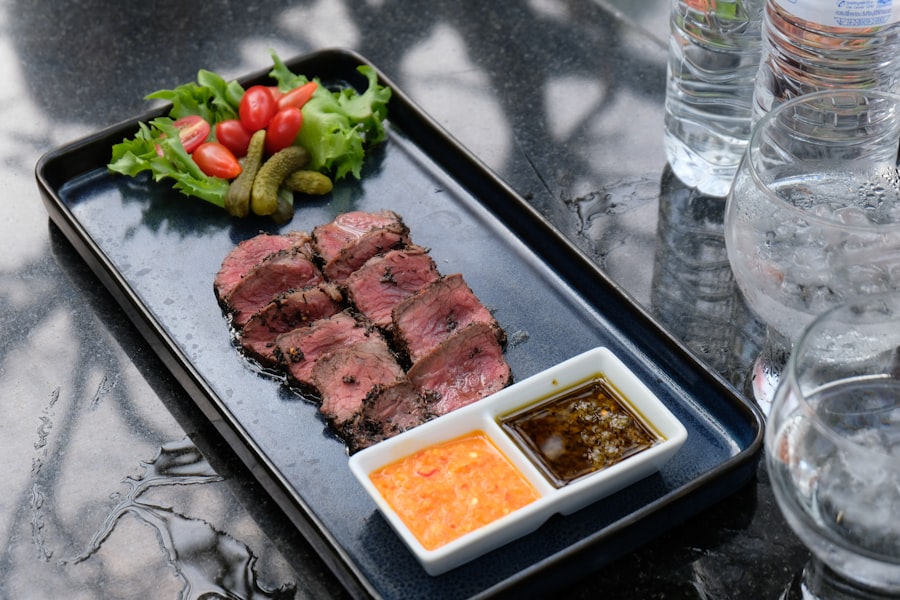 a plate of meat and vegetables on a table