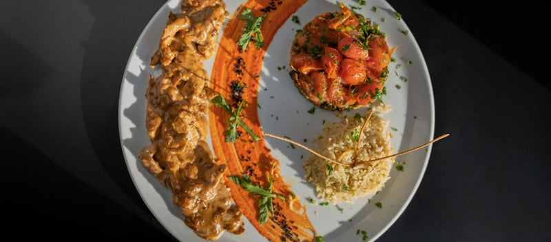 a white plate topped with different types of food