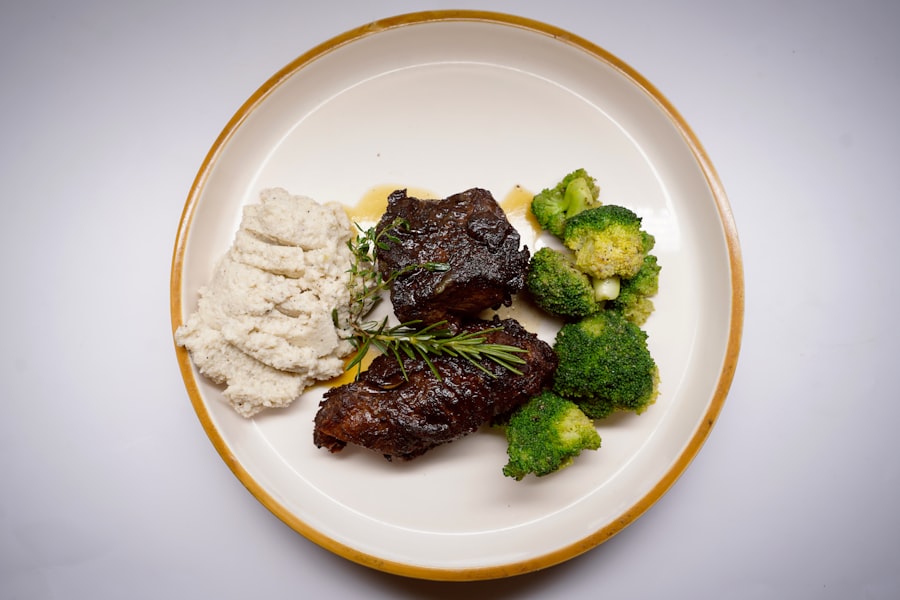 a white plate topped with meat and veggies