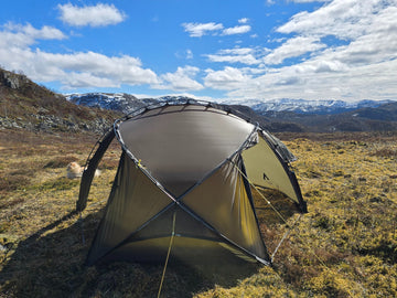 Nortent Vern 2 3S 2-person 3-season hiking tent – end vestibule rolled open, fly pitched on alpine heath