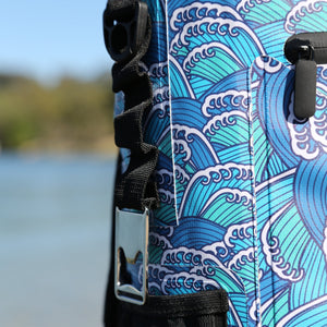 Tidal Trekker 15L Insulated Cooler Bag being carried on the beach